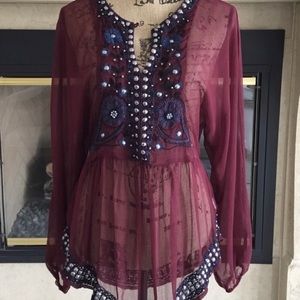Free People embroidered top with silver buttons.